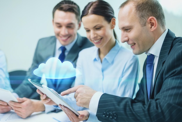 business technology cloud computing people concept smiling business team with tablet pc computer virtual cloud projection having discussion office 380164 86012